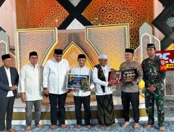​Peringati Nuzulul Quran, Polres Bogor Serahkan 2.000 Al-Quran Waqaf Personel di Acara Tabligh Akbar Masjid Baitul Faizin